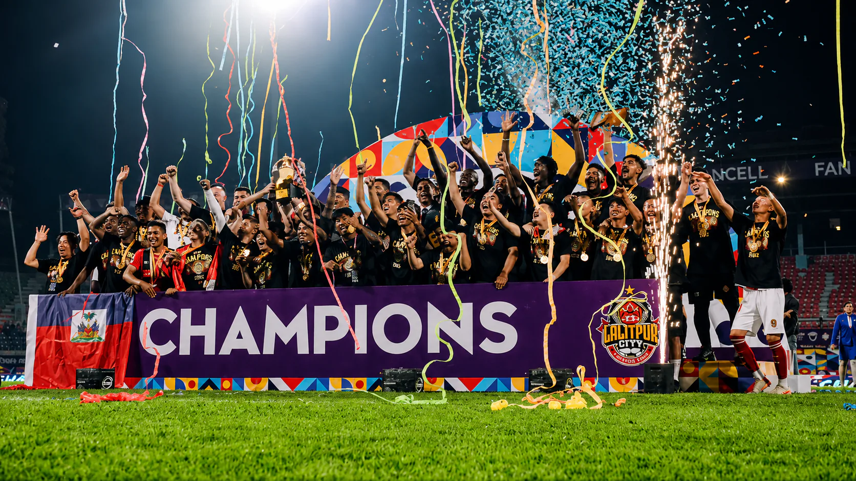 Lalitpur City FC players celebrating the championship with the trophy